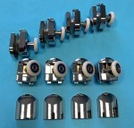 Ролики DC1008 Ø 25 мм на 2 двери, 4 верхние (одинарные) + 4 нижние (одинарные, с кнопкой) металл